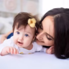mother-with-daughter-lie-bed-dog-looking-them_8353-5191-600x400